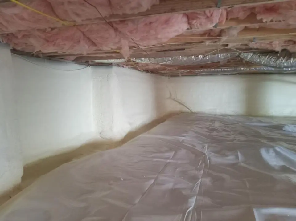Crawl space encapsulation with closed-cell spray foam for Commercial Roof Restoration in Estero